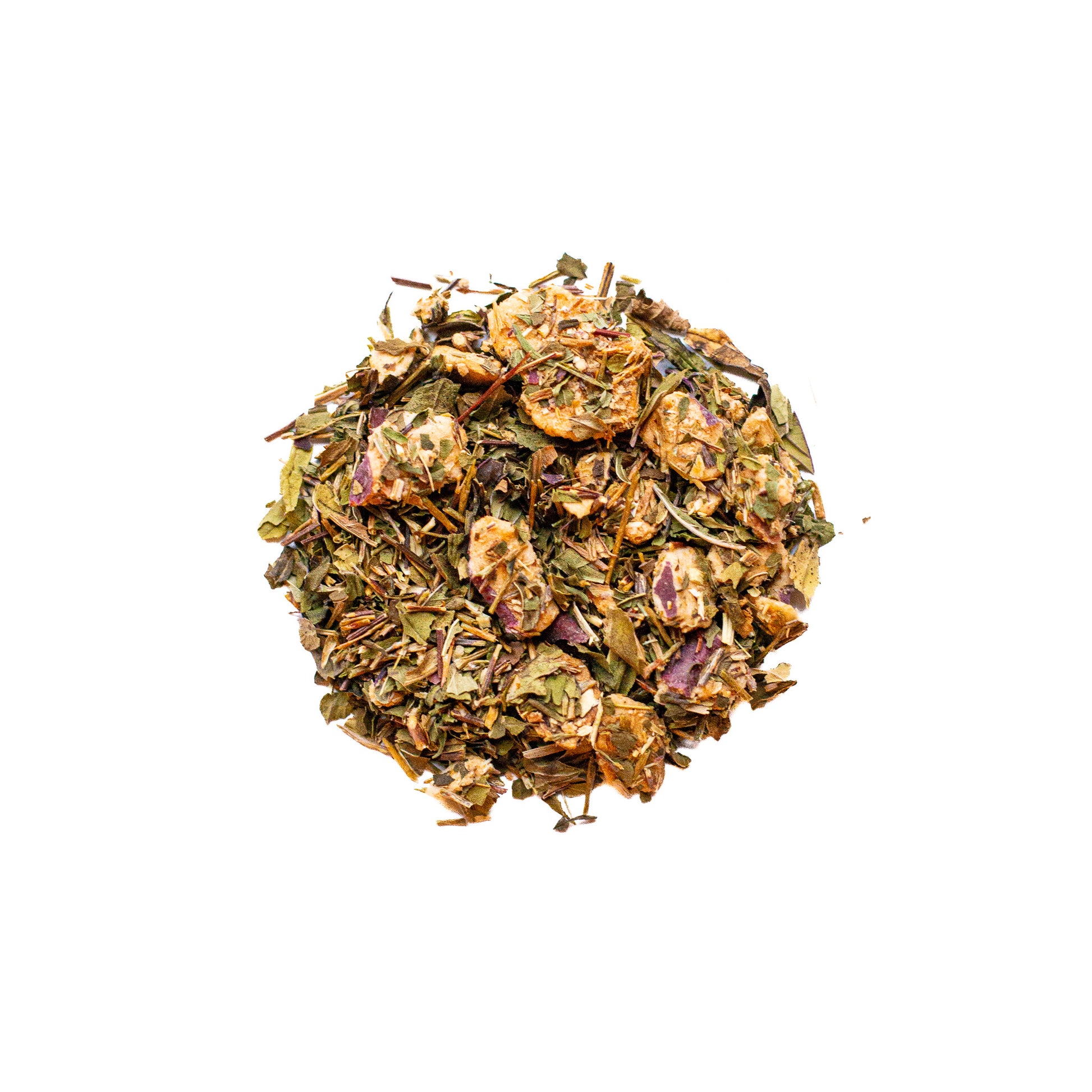 A close up of a pile of "Fulfill-Mint", a ToadStone Dried Goods tea blend, containing pieces of dried apple, peppermint leaves, and green rooibos.